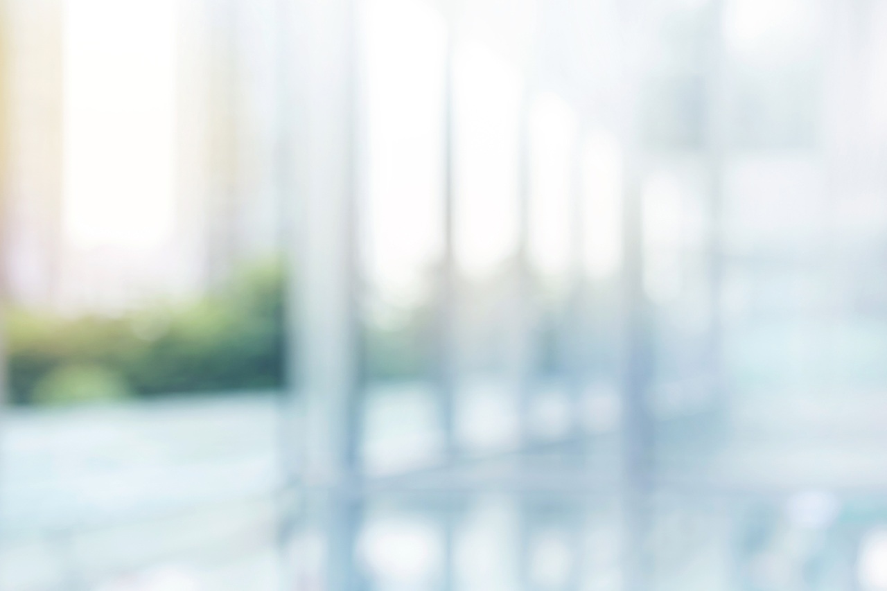 Blurred abstract grey glass wall building
